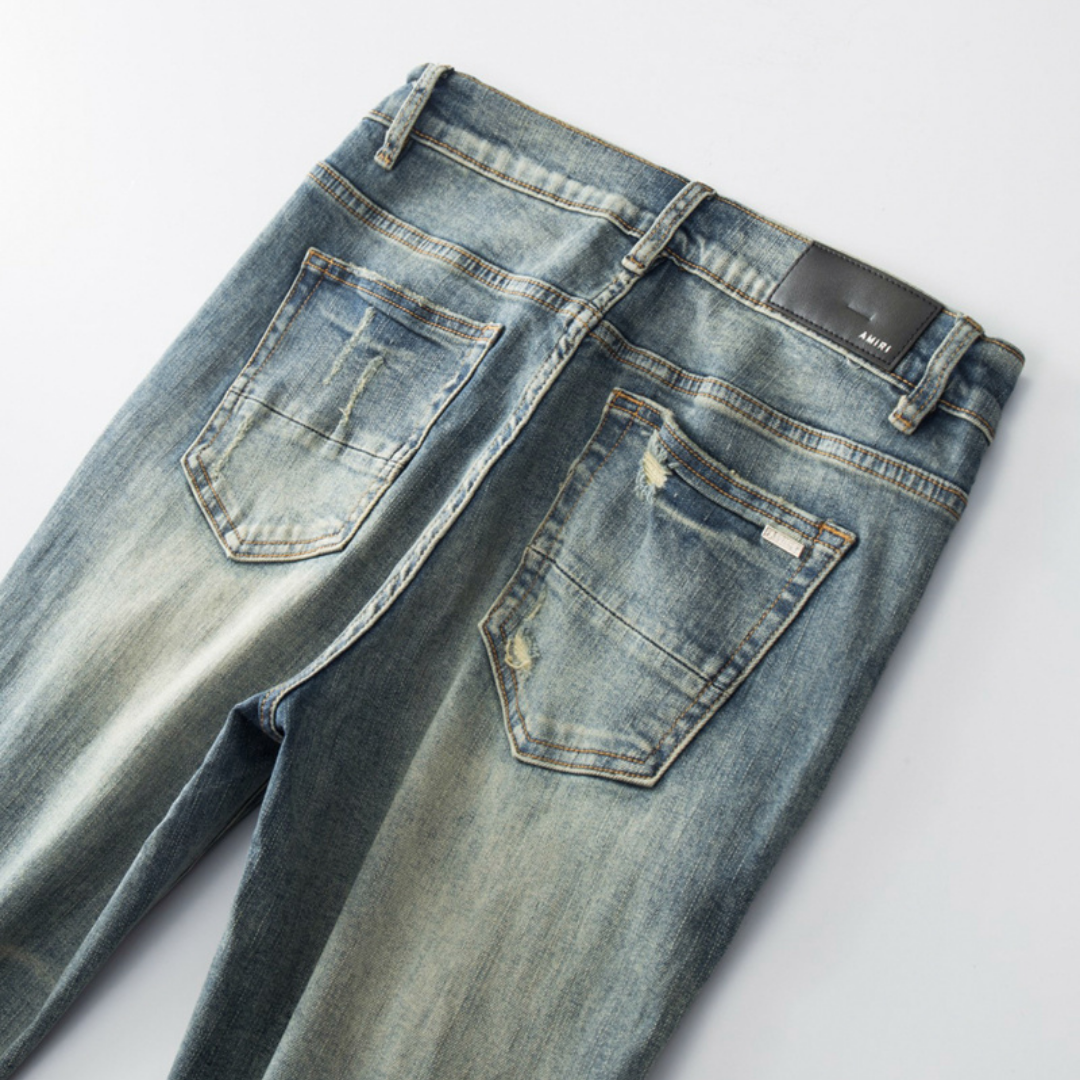 Amr Ripped Patch Jeans