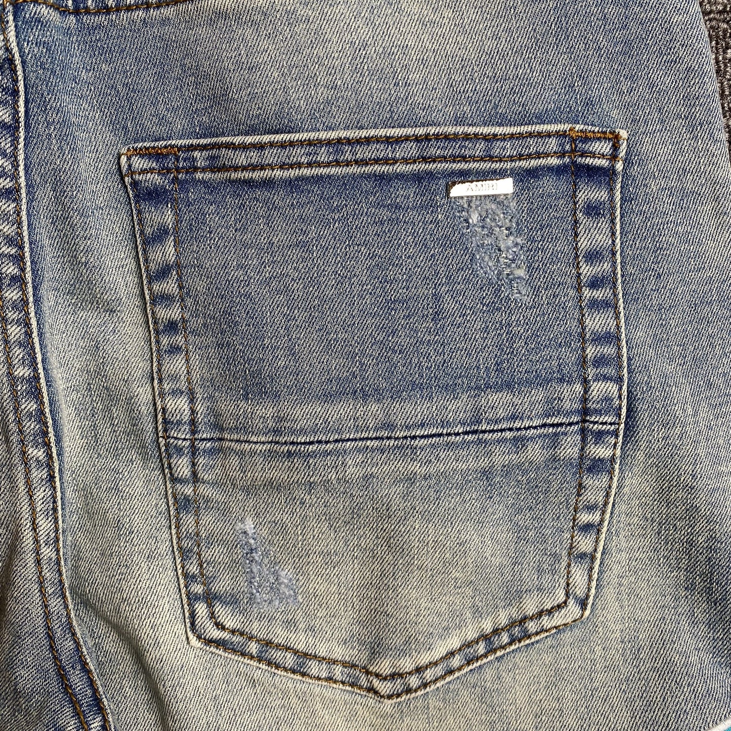 AMIRI VARSITY LOGO JEANS