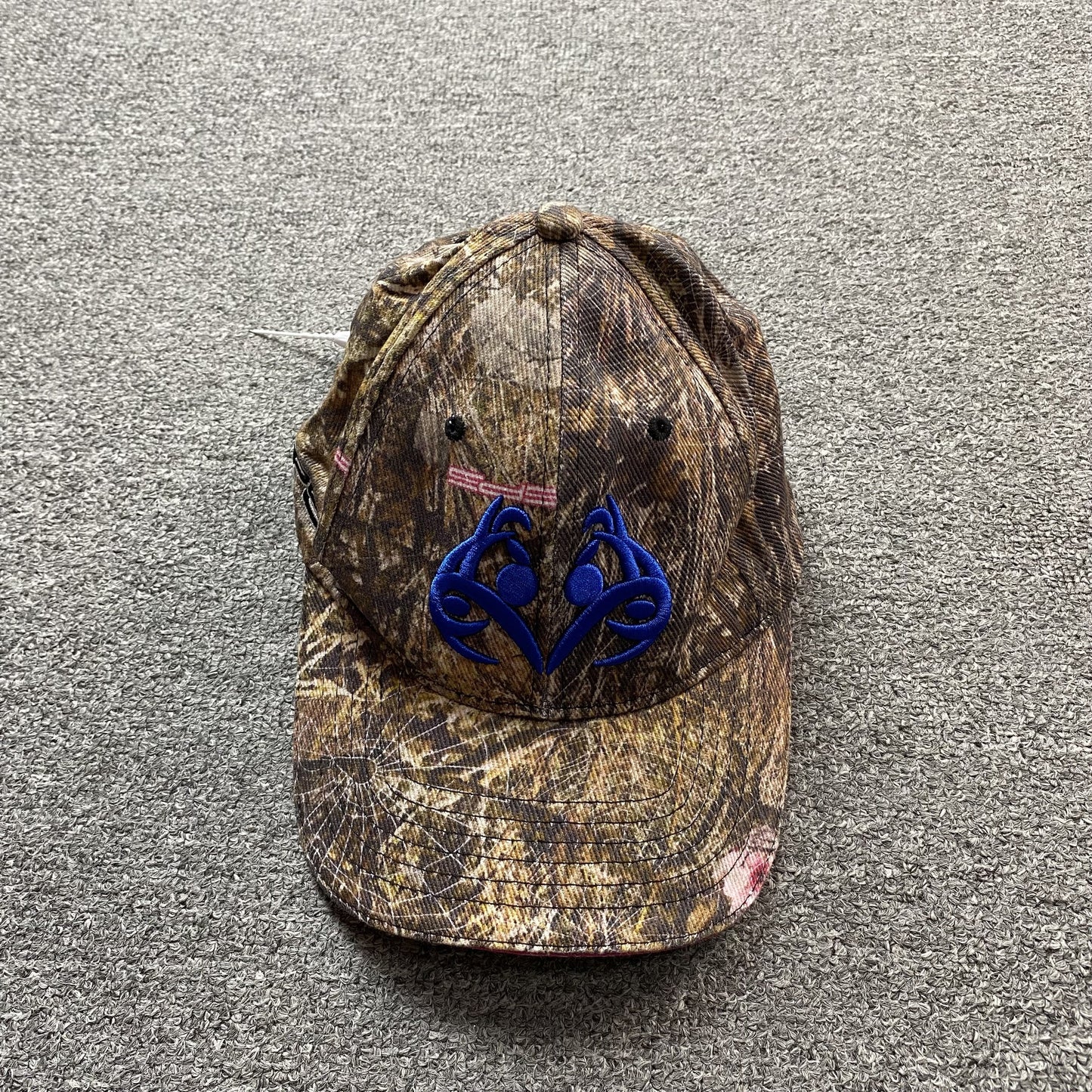 SP5DER BLUE LOGO CAP REAL TREE CAMO