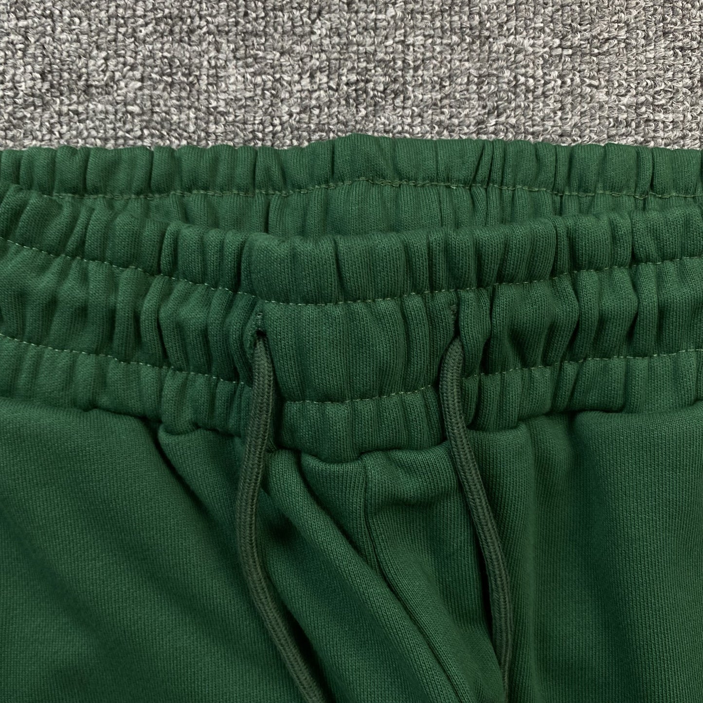DENIM TEARS COTTON WREATH SWEATPANTS DARK GREEN