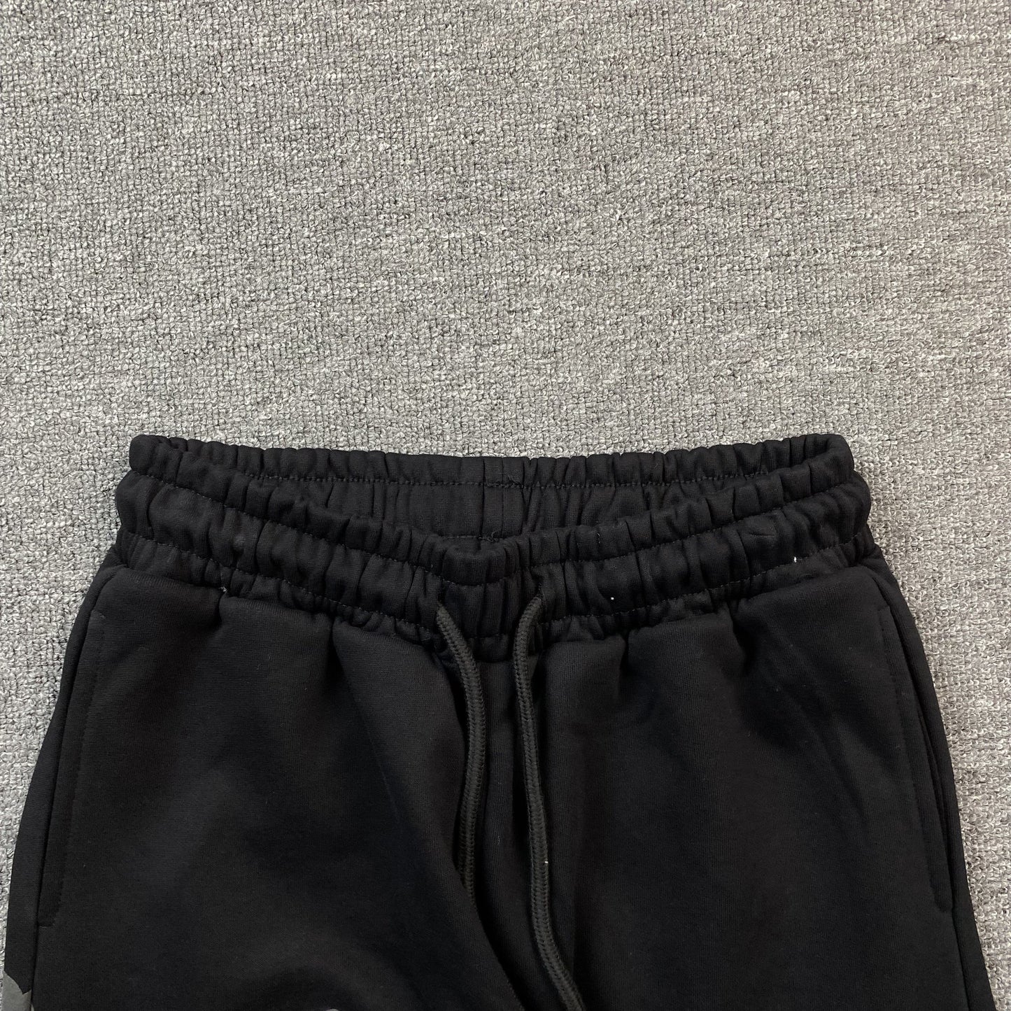 DENIM TEARS COTTON WREATH SWEATPANTS MONOCHROME BLACK