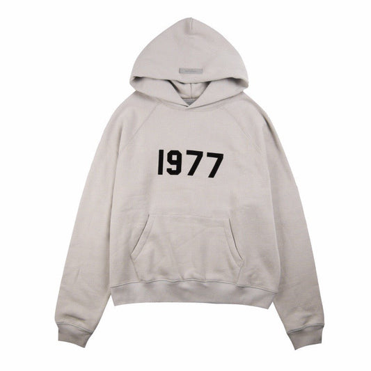 FEAR OF GOD ESSENTIALS "1977" HOODIE STONE GREY