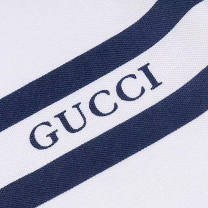 Christian Dior "Striped Logo" Polo Shirt