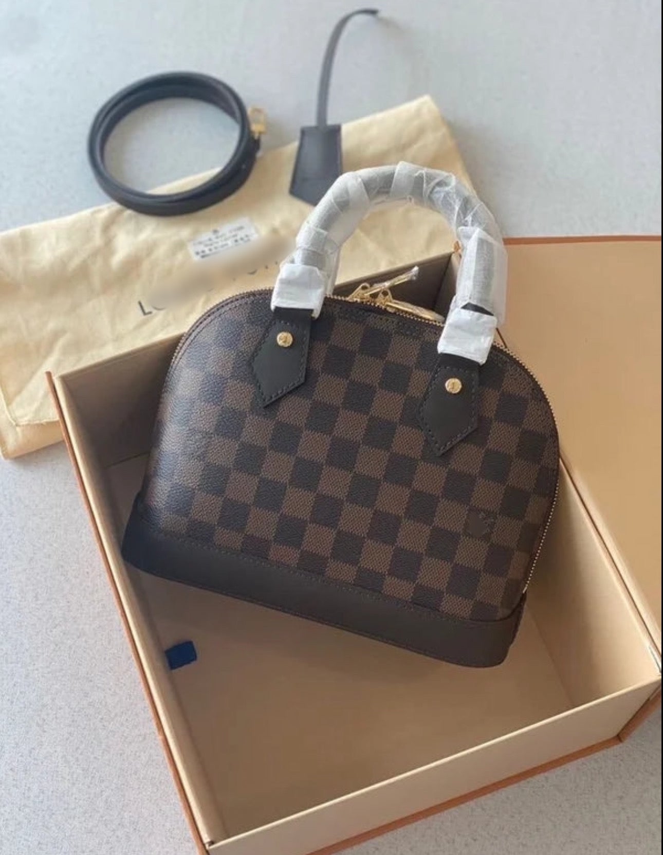 LV alma dark brown