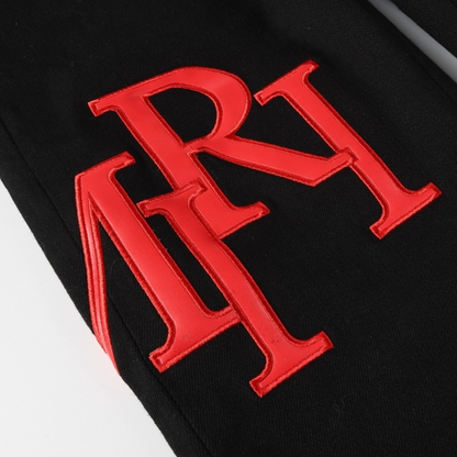 Amr Red Patch Staggered Jeans